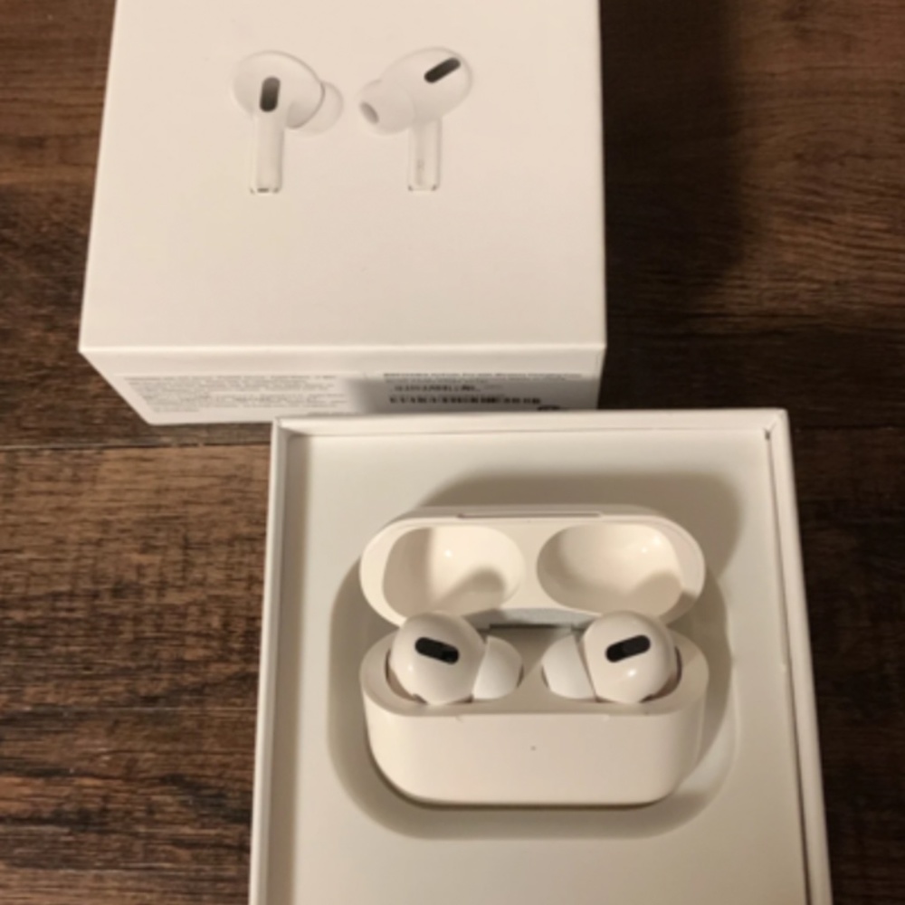 Airpod Pros In Hand - Picture 2 of 3